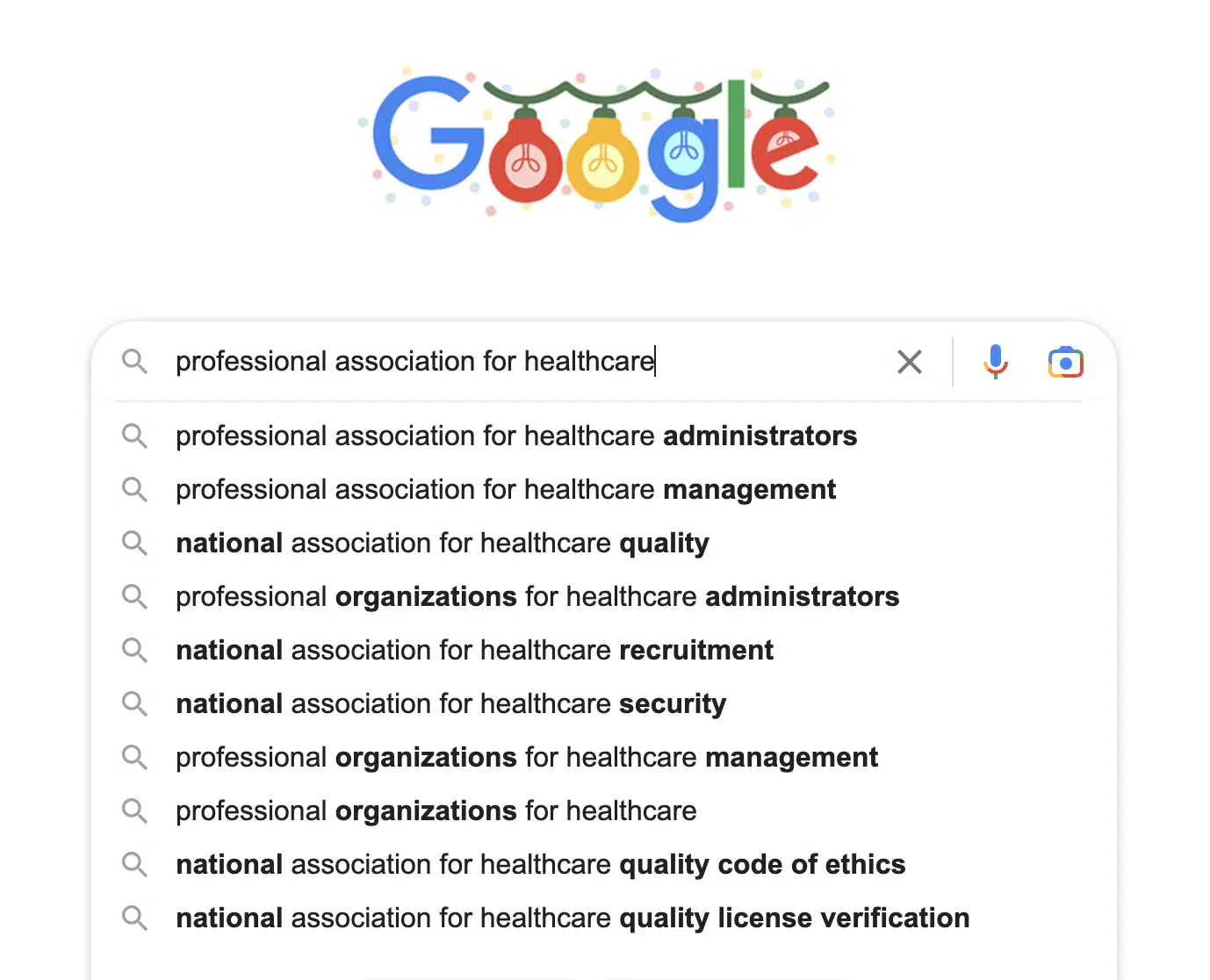a google search bar with a query typed in shows related searches underneath 